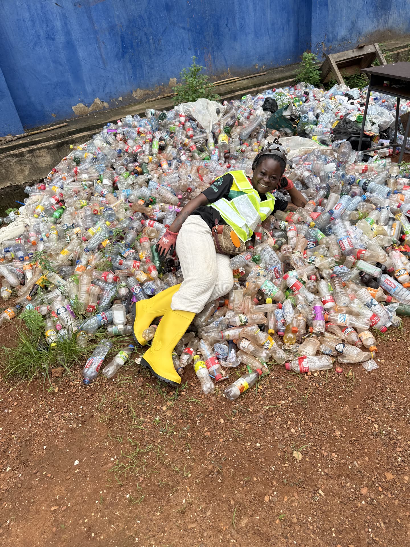 Plastoss collector at work in Ghana